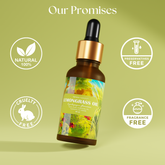 Bottle of lemongrass essential oil with fresh lemongrass stalks.