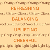 Orange essential oil bottle with fresh oranges for energy and revitalization.